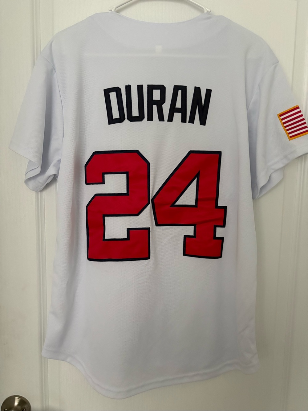 White Men's Athletic Jersey with Red Number 24 and Black Trim